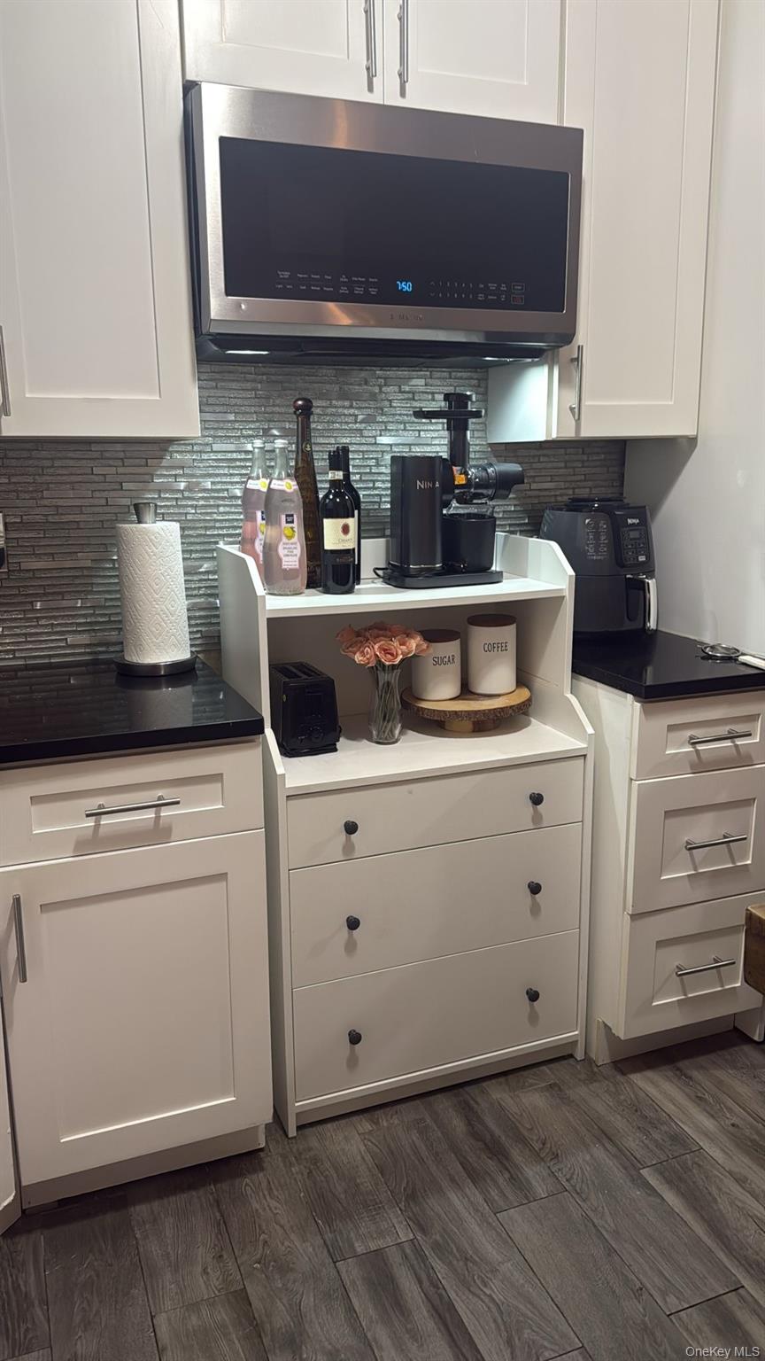 Photo of 10156 103rd Street, Ozone Park, NY 11416 (MLS # 1020579)