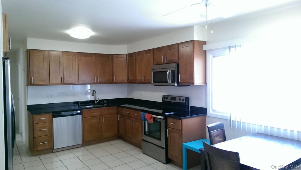 Photo of 15 Falcon Lane, Levittown, NY 11756 (MLS # 986513)