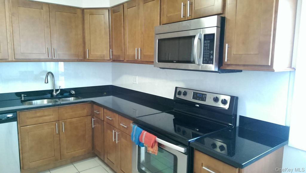 Photo of 15 Falcon Lane, Levittown, NY 11756 (MLS # 986513)