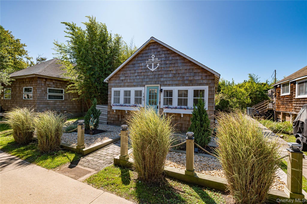 Photo of 140 Ocean Road, Ocean Beach, NY 11770 (MLS # 1051710)