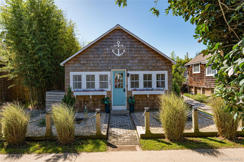 Photo of 140 Ocean Road, Ocean Beach, NY 11770 (MLS # 1051710)
