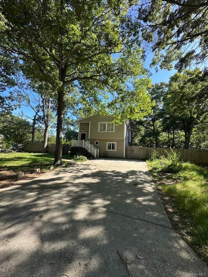 Photo of 45 Robinwood Street, Mastic, NY 11950 (MLS # 1057912)
