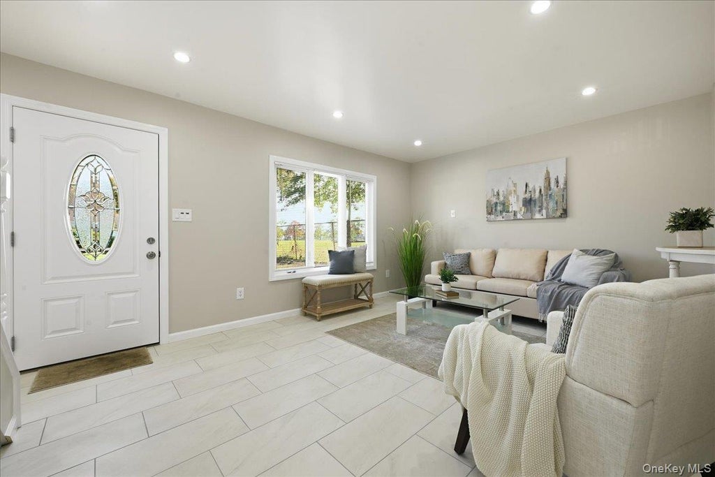 Photo of 4 Clover Lane, Westbury, NY 11590 (MLS # 1067833)