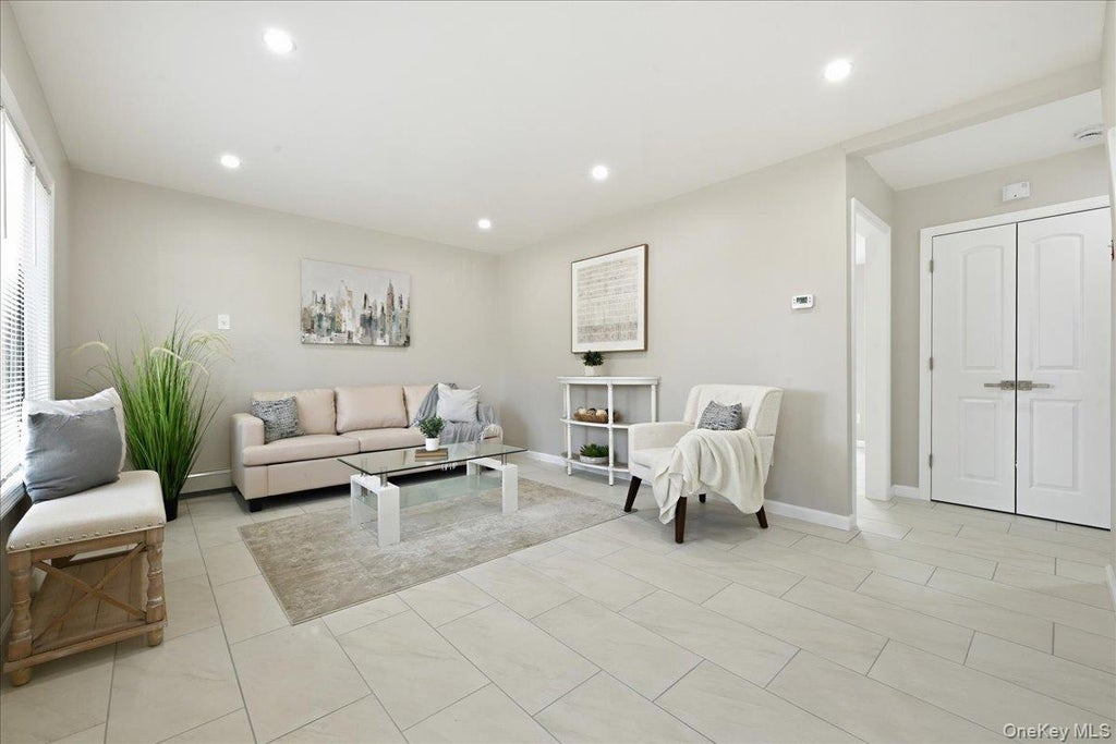 Photo of 4 Clover Lane, Westbury, NY 11590 (MLS # 1067833)