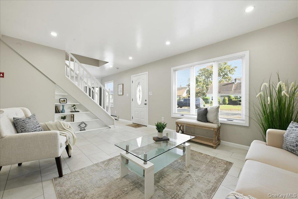 Photo of 4 Clover Lane, Westbury, NY 11590 (MLS # 1067833)