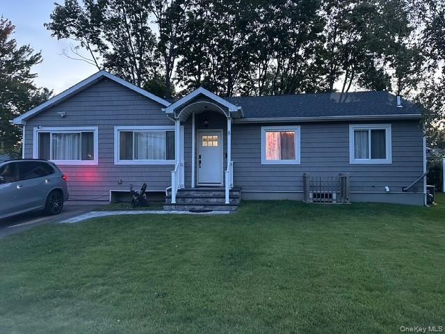 Photo of 8 Mayflower Court, Brentwood, NY 11717 (MLS # 1058199)