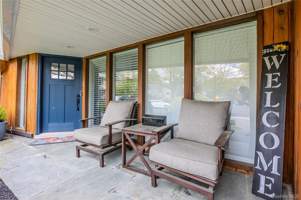 Photo of 10 Oak Brook Lane, Merrick, NY 11566 (MLS # 995432)