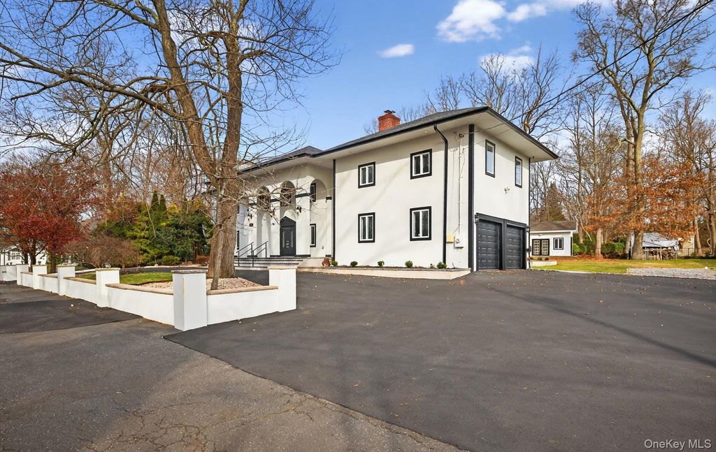 Photo of 369 Vanderbilt Parkway, Dix Hills, NY 11746 (MLS # 942725)