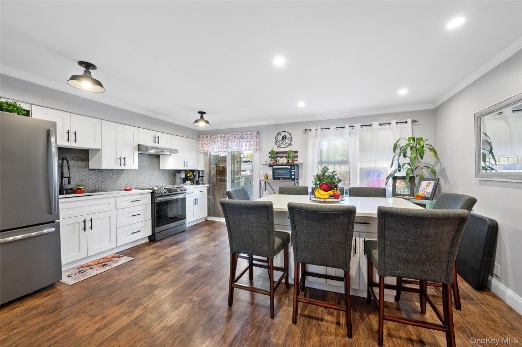 Photo of 6991 Caldwell Avenue, Maspeth, NY 11378 (MLS # 1039184)