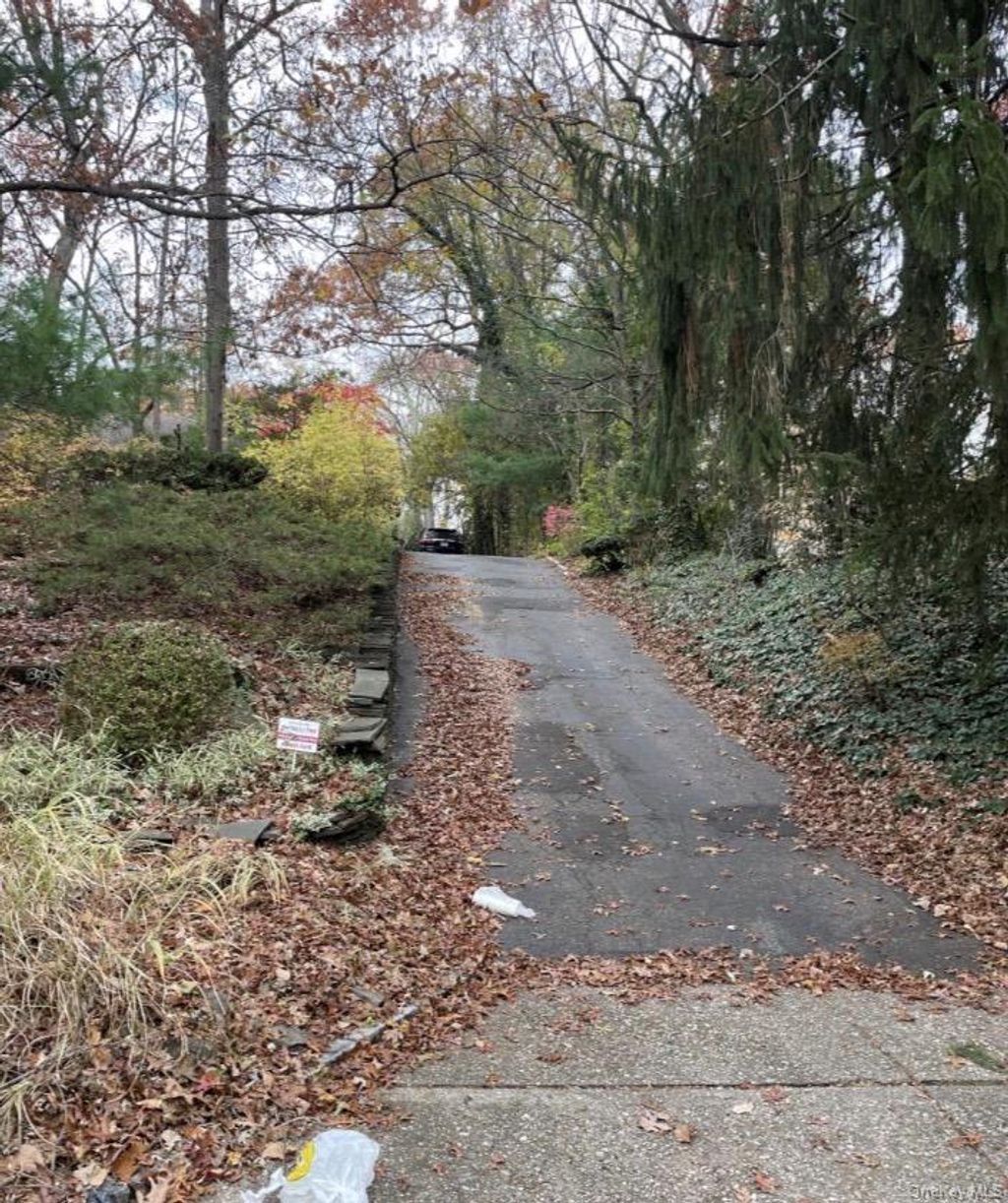 Photo of 12 Talisman Drive, Dix Hills, NY 11746 (MLS # 993447)