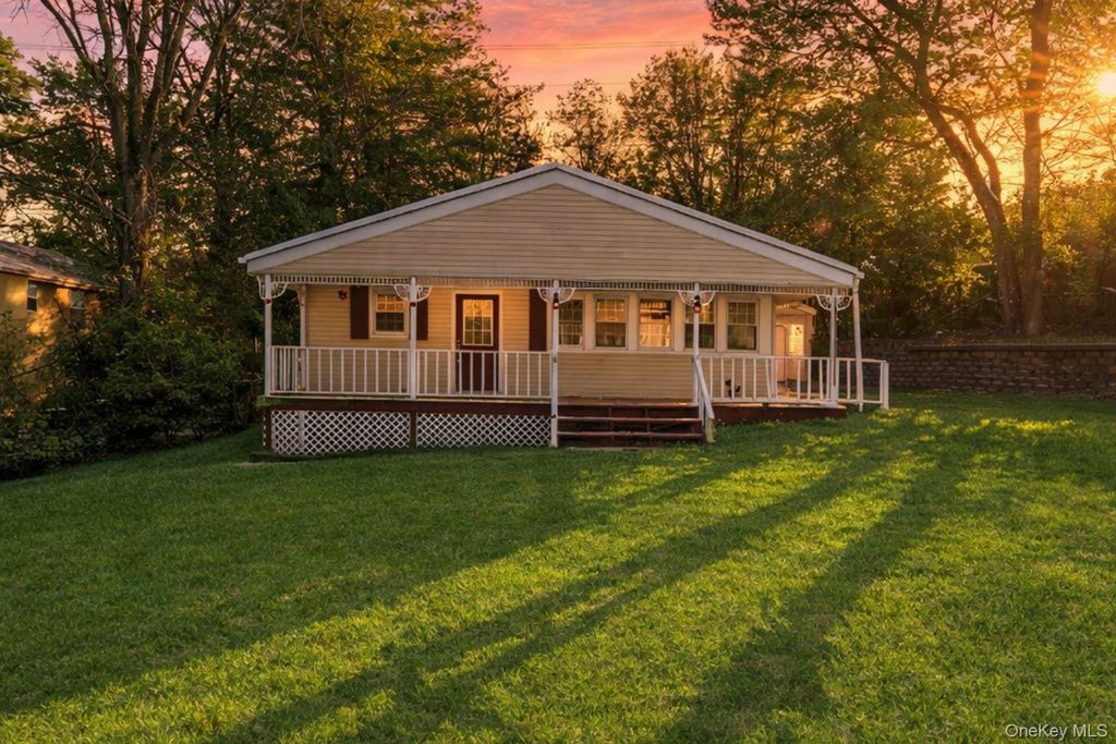 Photo of 10 Pinedale Avenue, Farmingville, NY 11738 (MLS # 973133)