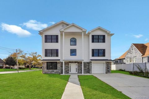 Photo of 322 Miller Avenue, Freeport, NY 11520 (MLS # 928671)