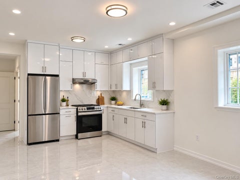 Photo of 5647 136th Street, Flushing, NY 11355 (MLS # 1046951)