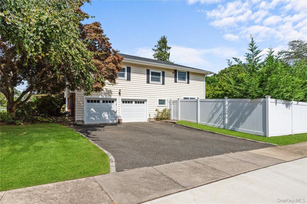 Photo of 71 Roosevelt Drive, East Norwich, NY 11732 (MLS # 1055717)