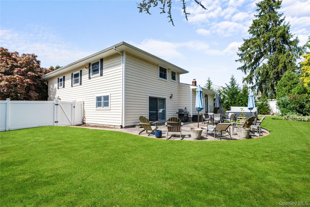 Photo of 71 Roosevelt Drive, East Norwich, NY 11732 (MLS # 1055717)