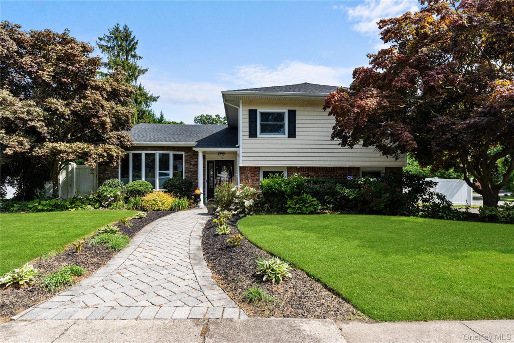 Photo of 71 Roosevelt Drive, East Norwich, NY 11732 (MLS # 1055717)