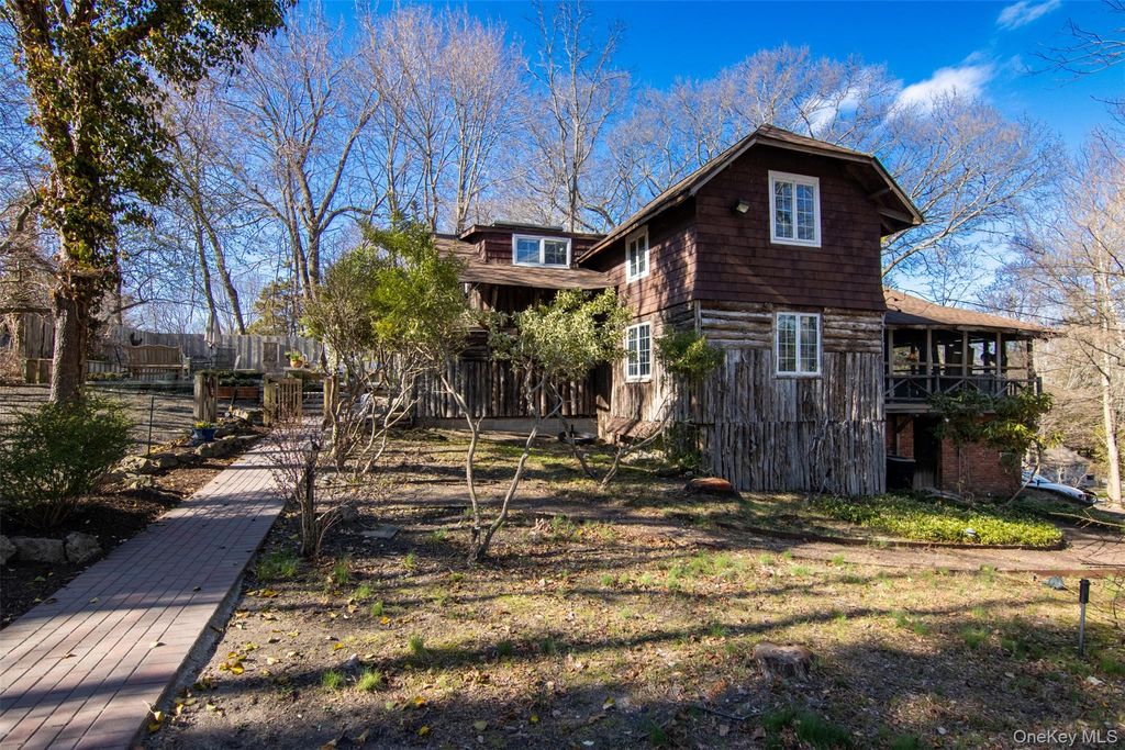 Photo of 10 Tagliabue Road, Shoreham, NY 11786 (MLS # 981677)