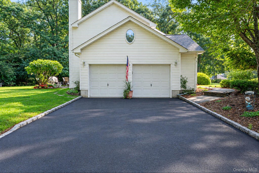 Photo of 1 Chen Court, Middle Island, NY 11953 (MLS # 1047975)
