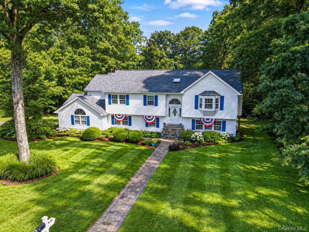 Photo of 1 Chen Court, Middle Island, NY 11953 (MLS # 1047975)