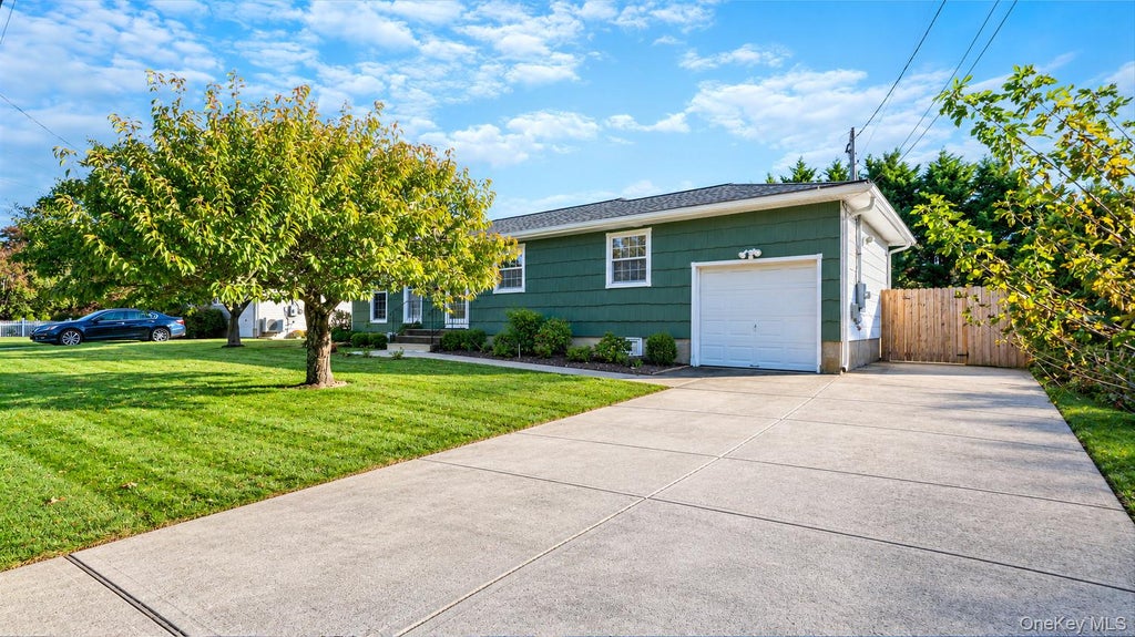 Photo of 244 Neptune Avenue, West Babylon, NY 11704 (MLS # 1065760)
