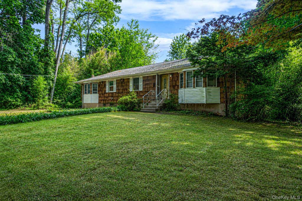 Photo of 11 Radio Avenue, Miller Place, NY 11764 (MLS # 1030186)