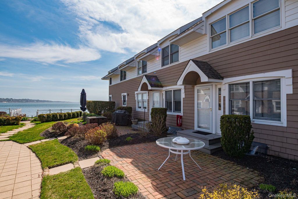 Photo of 49 Canoe Place Road #212, Hampton Bays, NY 11946 (MLS # 979877)