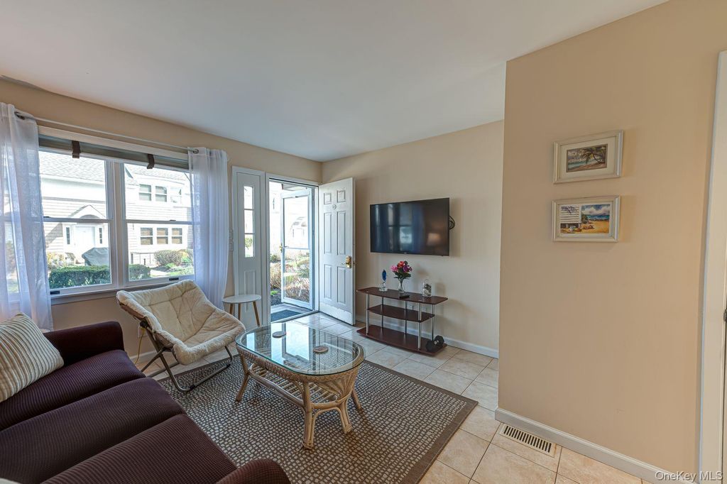 Photo of 49 Canoe Place Road #212, Hampton Bays, NY 11946 (MLS # 979877)