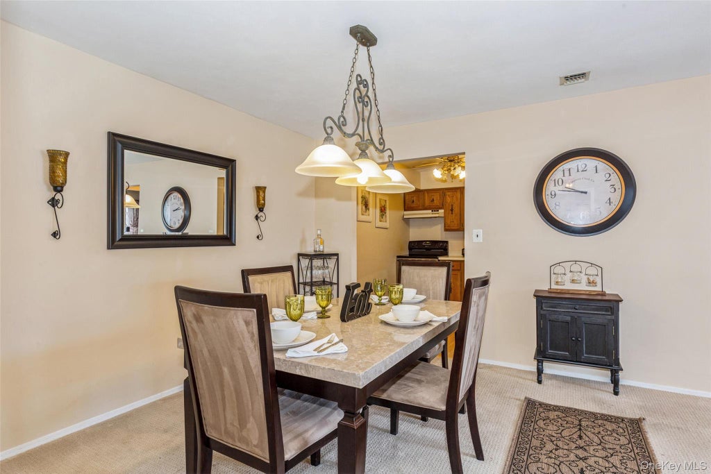 Photo of 6 Cambridge Drive W, Copiague, NY 11726 (MLS # 1050820)