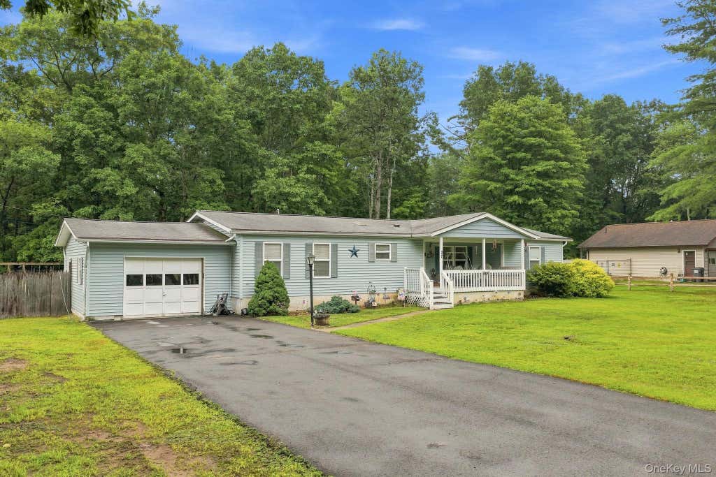 Photo of 27 Delaware Drive, Sparrowbush, NY 12780 (MLS # 1024472)