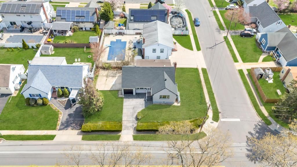 Photo of 207 August Road, North Babylon, NY 11703 (MLS # 985618)