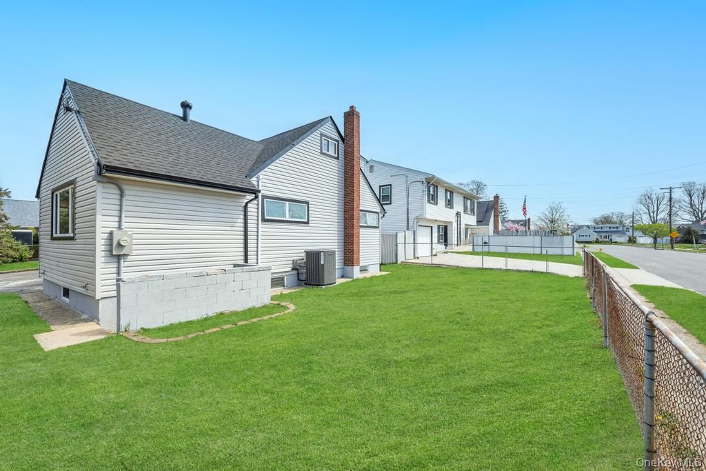 Photo of 207 August Road, North Babylon, NY 11703 (MLS # 985618)