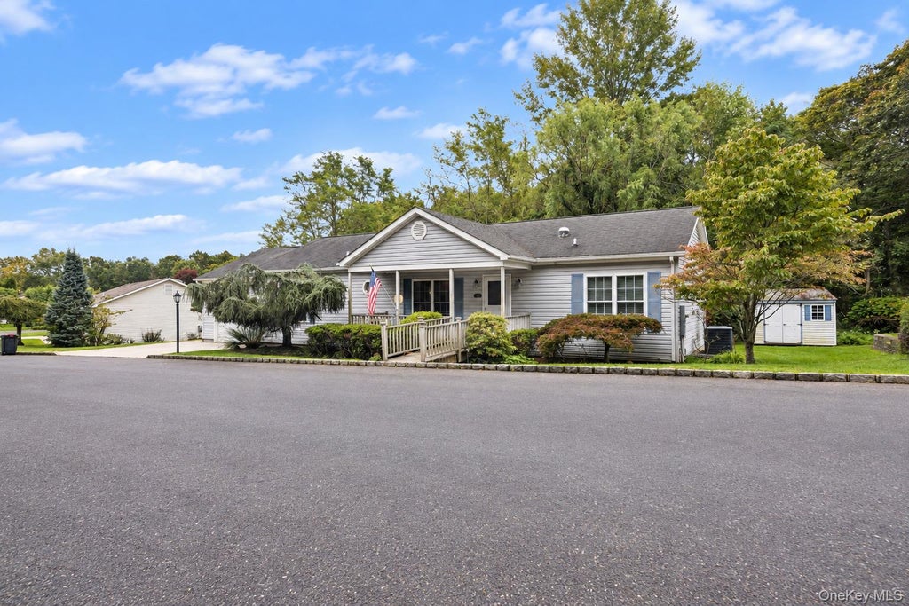 Photo of 1407 Middle Road #245, Calverton, NY 11933 (MLS # 1022776)