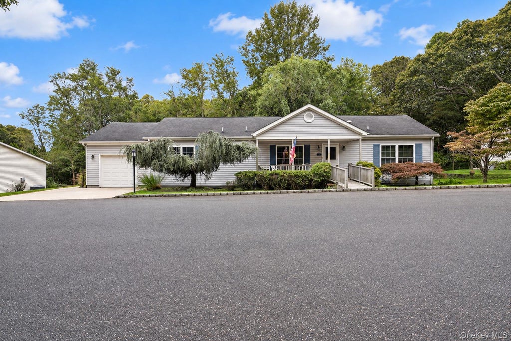 Photo of 1407 Middle Road #245, Calverton, NY 11933 (MLS # 1022776)