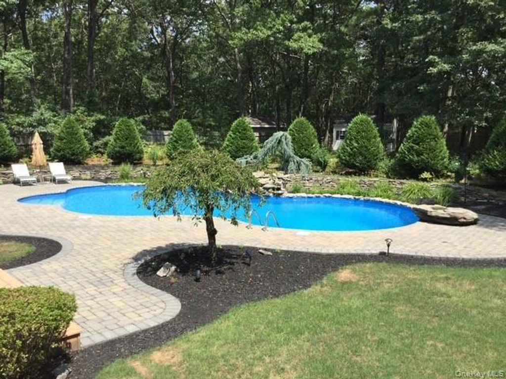 Photo of 3 Farmhouse Drive, Ridge, NY 11961 (MLS # 921396)