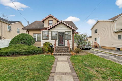 Photo of 82 E Clinton Avenue, Roosevelt, NY 11575 (MLS # 936243)