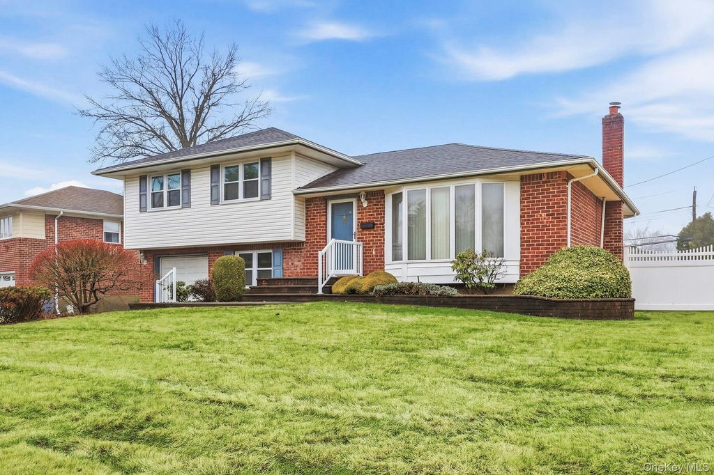 Photo of 48 Eastfield Lane, Melville, NY 11747 (MLS # 972914)