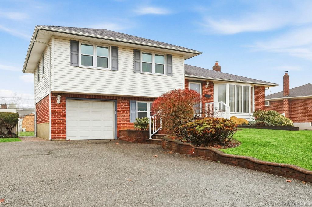 Photo of 48 Eastfield Lane, Melville, NY 11747 (MLS # 972914)