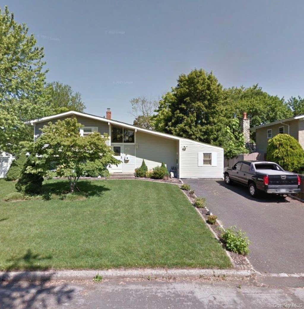 Photo of 128 W Court Drive, Centereach, NY 11720 (MLS # 1041729)