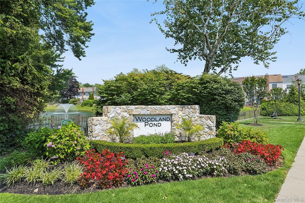 Photo of 137 Woodlake Drive W, Woodbury, NY 11797 (MLS # 957499)