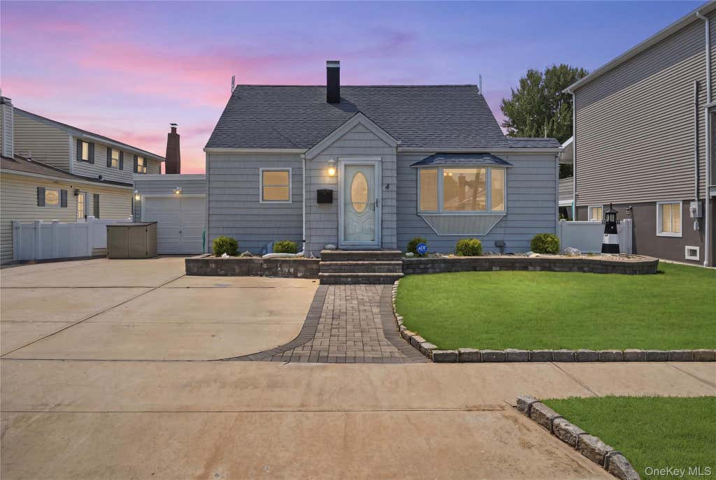 Photo of 4 Flint Road, Amity Harbor, NY 11701 (MLS # 1027505)