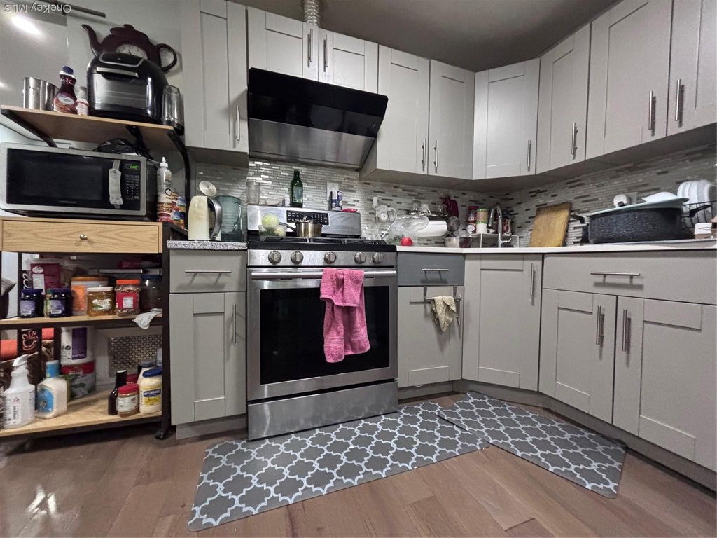 Photo of 153-17 111 Avenue, Jamaica, NY 11433 (MLS # 943962)