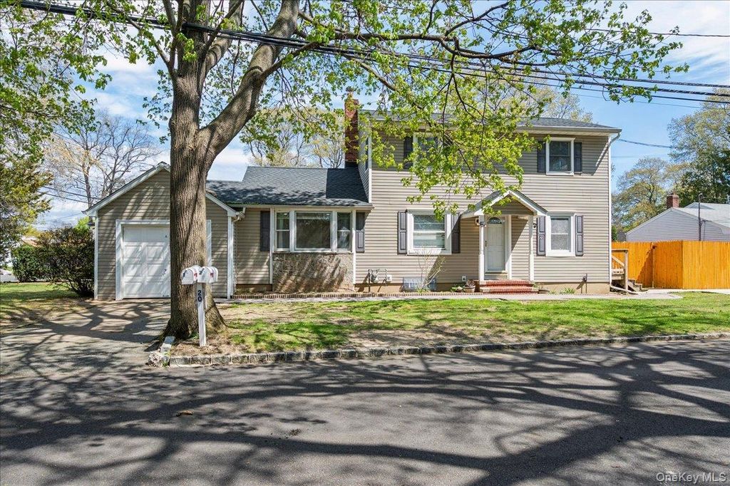 Photo of 20 Cambridge Avenue, Melville, NY 11747 (MLS # 988694)