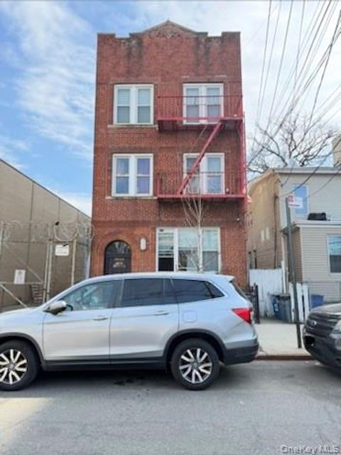 Photo of 100-04 Spruce Street, Corona, NY 11368 (MLS # 985544)