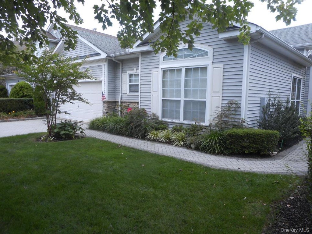 Photo of 173 Hamlet Drive, Mount Sinai, NY 11766 (MLS # 1055911)