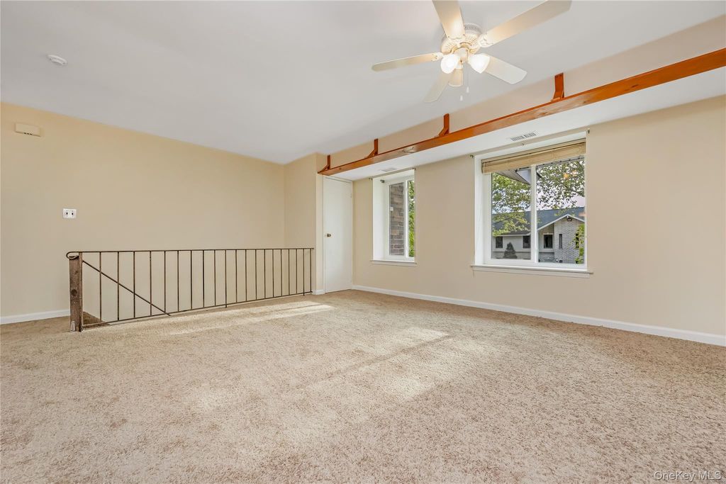 Photo of 10 Aspen Court Ct #10, Coram, NY 11727 (MLS # 1000217)