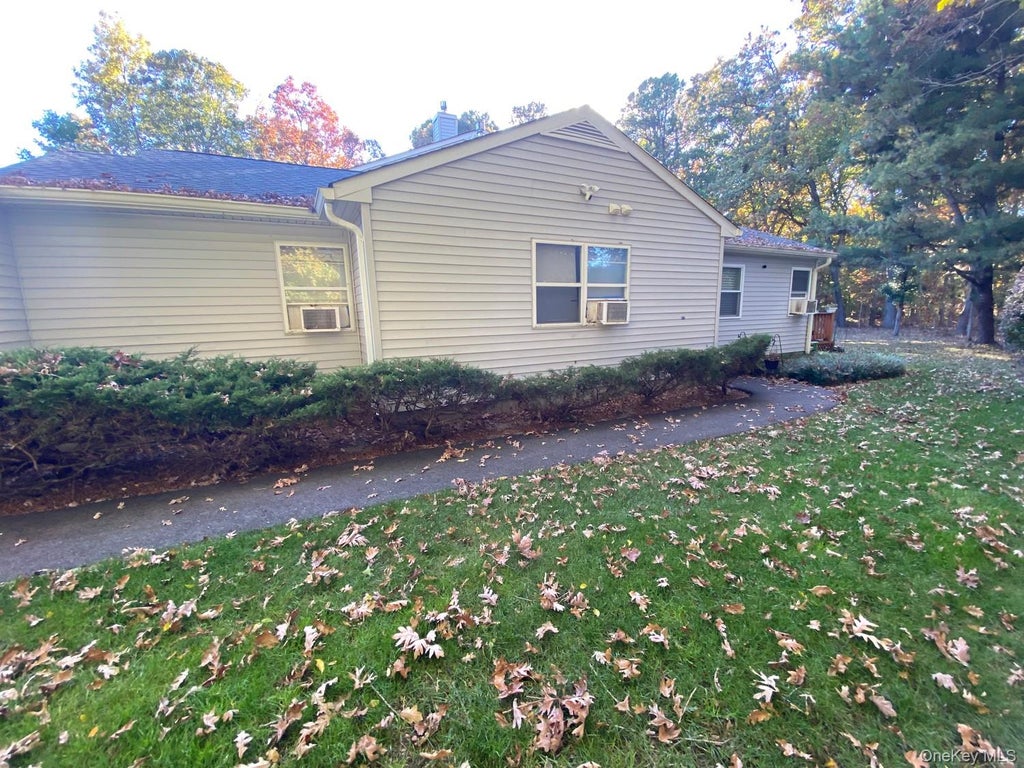 Photo of 16 Cal Ct Court, Manorville, NY 11949 (MLS # 1067636)