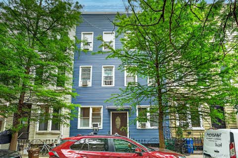 Photo of 34 Sutton Street, Brooklyn, NY 11222 (MLS # 1010064)