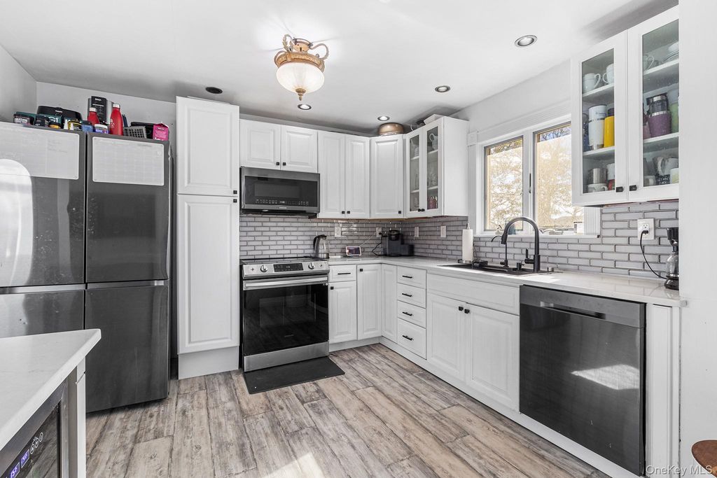 Photo of 20 Malcolm Street, Brookhaven, NY 11713 (MLS # 921470)