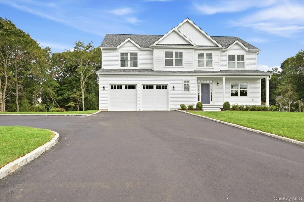 Photo of 469 Clay Pitts Road, East Northport, NY 11731 (MLS # 1051038)
