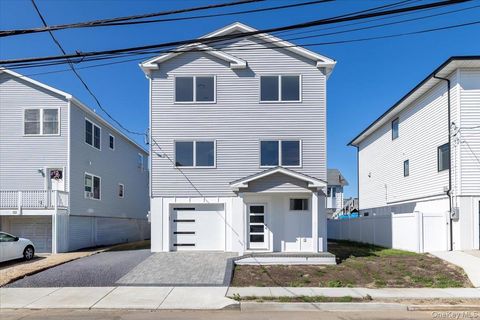 Photo of 12 Pershing Place, Island Park, NY 11558 (MLS # 874176)